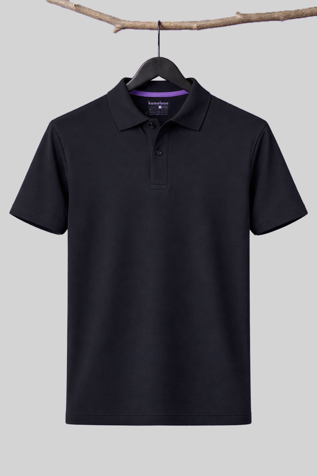 Black polo shirt on a hanger against a light gray background